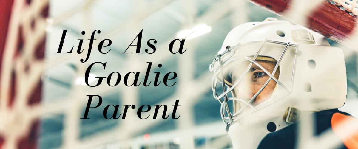 Life as a Goalie Parent picturing Goalie face behind net