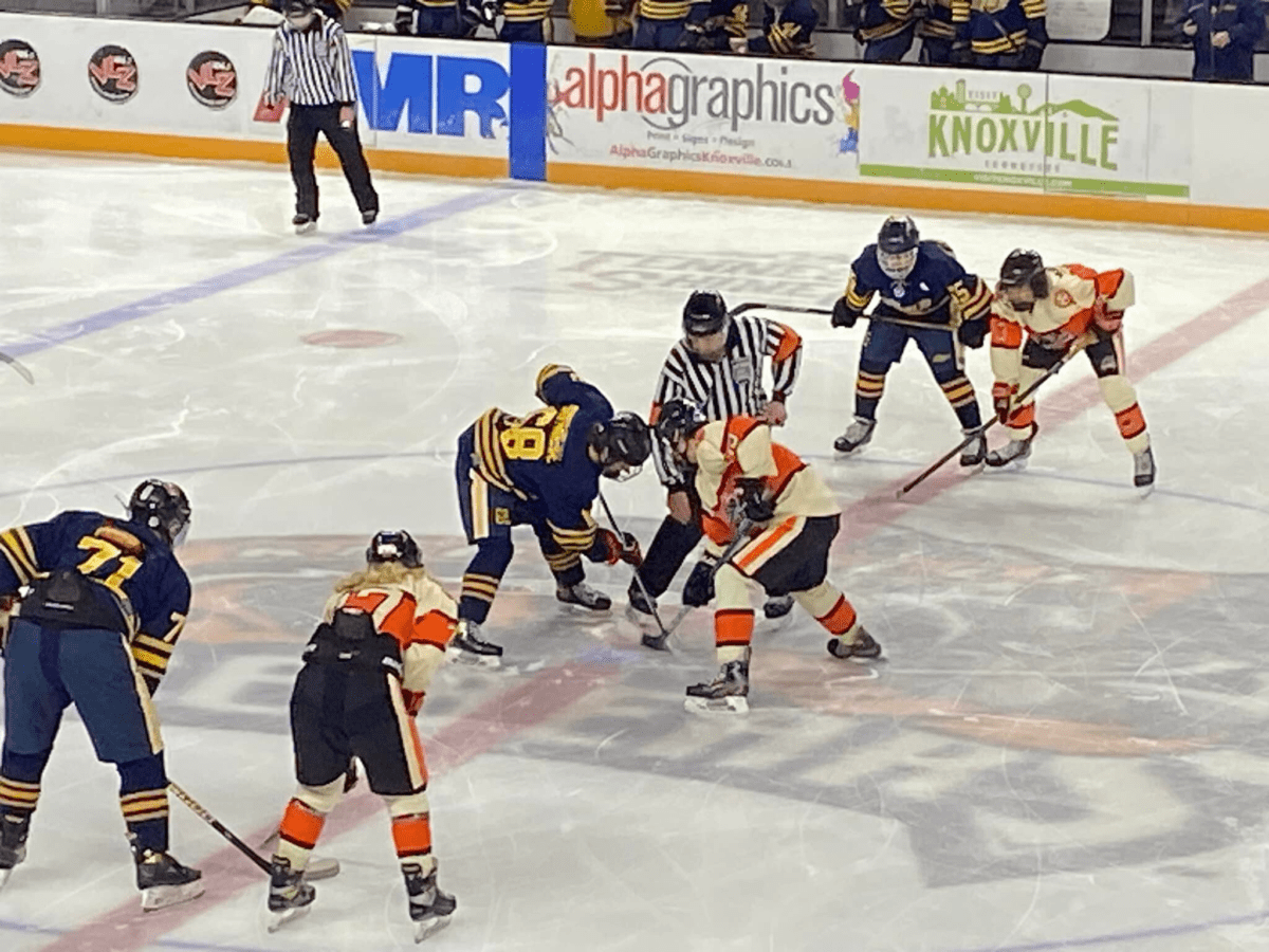 Two offensive lines at a face-off.  
Both lines have 3 players on the offensive forward line