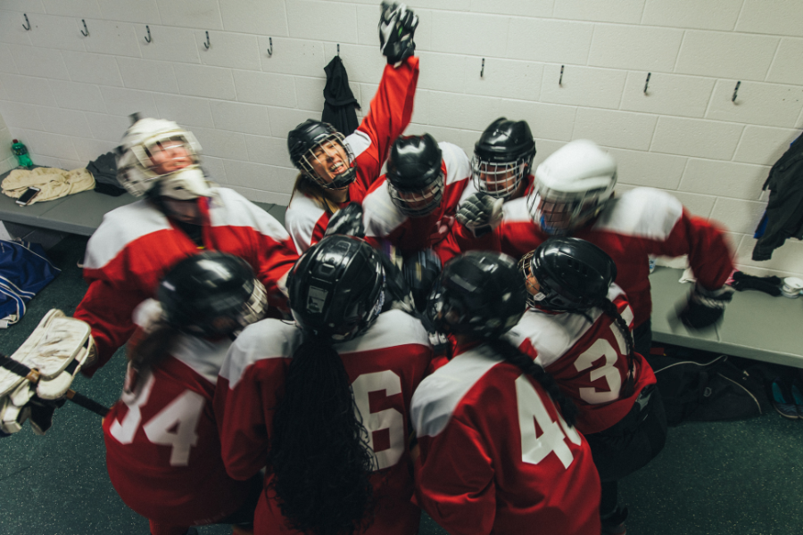 Team celebrating in locer room.