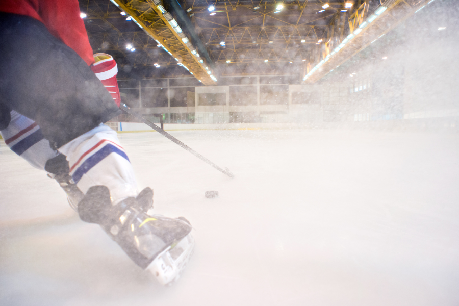 Ice Hockey skating on the side