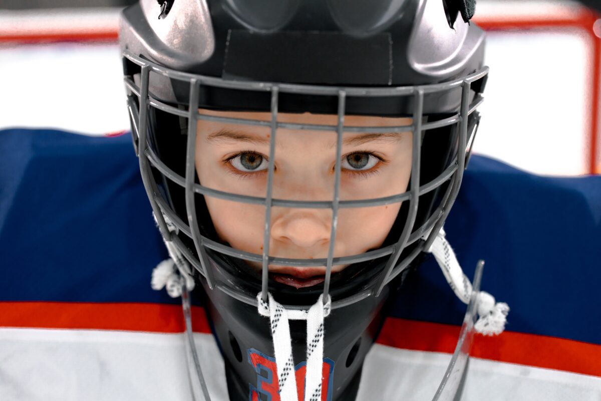 face of young goalie red and blue byron lach 8974648